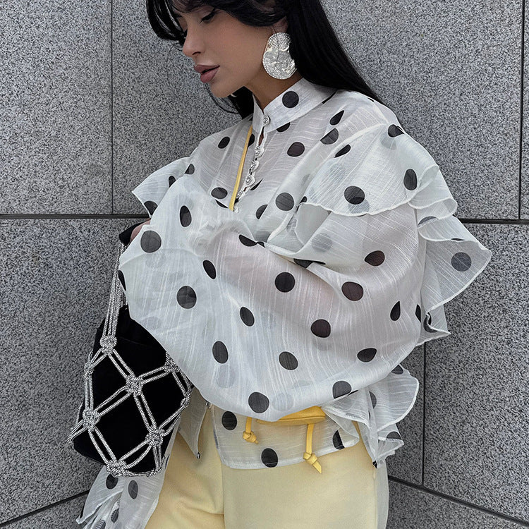 Elegant white shawl with black polka dots, soft lightweight fabric, trendy and stylish women's fashion accessory