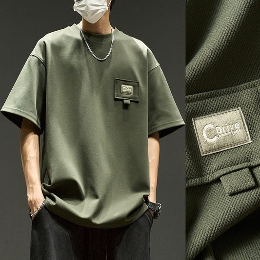 Men’s waffle knit oversized T-shirt in olive green — front view.
