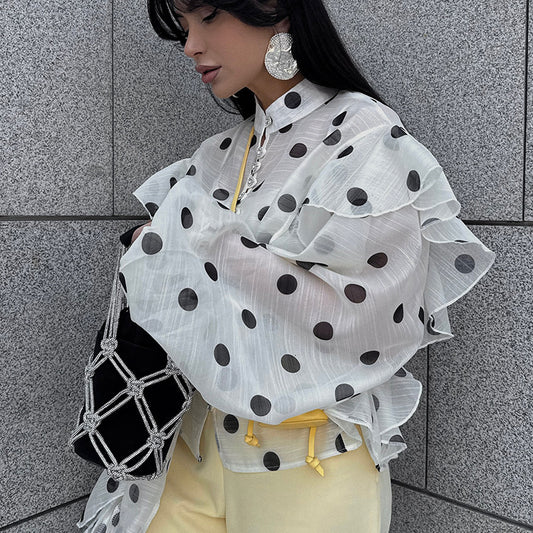 Elegant white shawl with black polka dots, soft lightweight fabric, trendy and stylish women's fashion accessory

