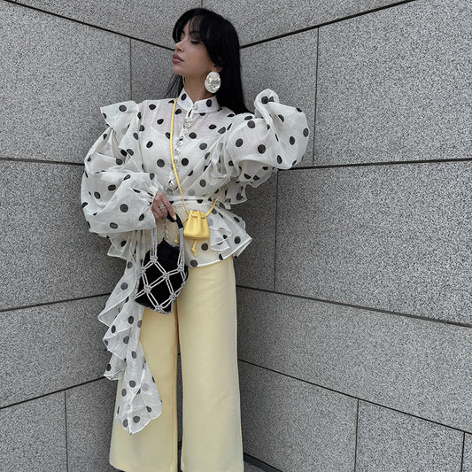 Elegant white shawl with black polka dots, soft lightweight fabric, trendy and stylish women's fashion accessory
